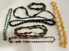 Collection of bead necklaces including malachite.