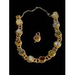 Gold coloured gem set bracelet, with spare link but damaged fastener.