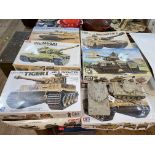 Collection of tank model kits including Tamiya.