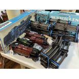Japanese modern steam locomotive type C5711 boxed, Marklin transformer, two wagons and track,