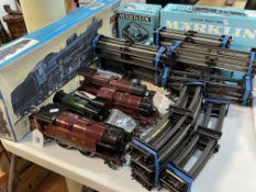 Japanese modern steam locomotive type C5711 boxed, Marklin transformer, two wagons and track,