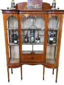 Edwardian inlaid mahogany inverted breakfront vitrine on six square tapering legs to spade feet,