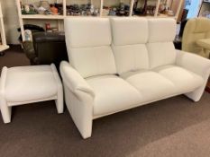 Contemporary white leather three seater reclining settee and footstool.