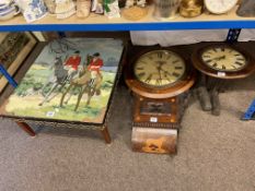 Tapestry top low coffee table and two Victorian wall clocks.