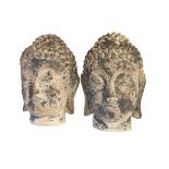 Pair of composite busts of Chinese Buddha's.