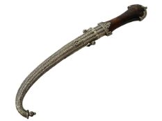 Indian dagger with ornate white metal scabbard, 48cm.
