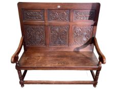 Oak triple carved panel back hall bench, 114cm by 114cm by 51cm.