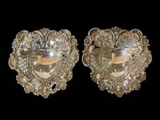 Pair of silver embossed and pierced bon bon dishes by Joseph Heming, London 1894.