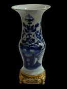 Large Chinese blue and white vase on gilt/brass metal base, 42cm.