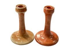 Two Ruskin pottery candlesticks, 17cm.