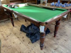 6ft by 3ft snooker table on turned leg stand with accessories including cues, rests, set of ball,
