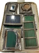 Collection of nine silver photograph frames.