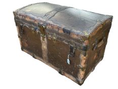 Vintage canvas, leather and brass bound dome topped travelling trunk, 54cm by 87cm by 49cm.