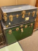 Two vintage travelling trunks, largest 56cm by 87cm by 50cm.