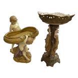 Austrian double maiden centre piece of ornate vine form, 38cm, and two cherub centre piece (2).