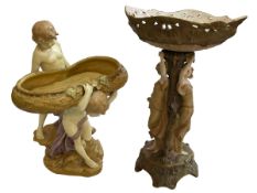 Austrian double maiden centre piece of ornate vine form, 38cm, and two cherub centre piece (2).