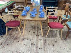 Vintage Ercol elm rectangular dining table and set of four unusual Ercol shaped ladder back elbow