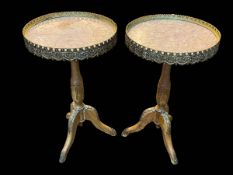 Pair Continental marble inset top and gilt mounted tripod wine tables, 57.5cm by 34cm diameter.