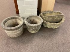 Collection of four garden planters.