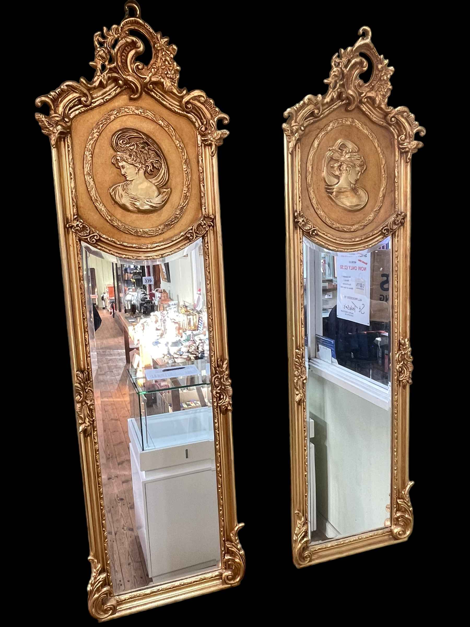 Pair rectangular gilt framed lady portrait bevelled wall mirrors, 178cm by 53cm.