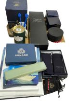 Collection of Cunard memorabilia including Halcyon Days, Queen Victoria red wine, luggage tags, etc.
