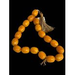 Amber colour large bead necklace.