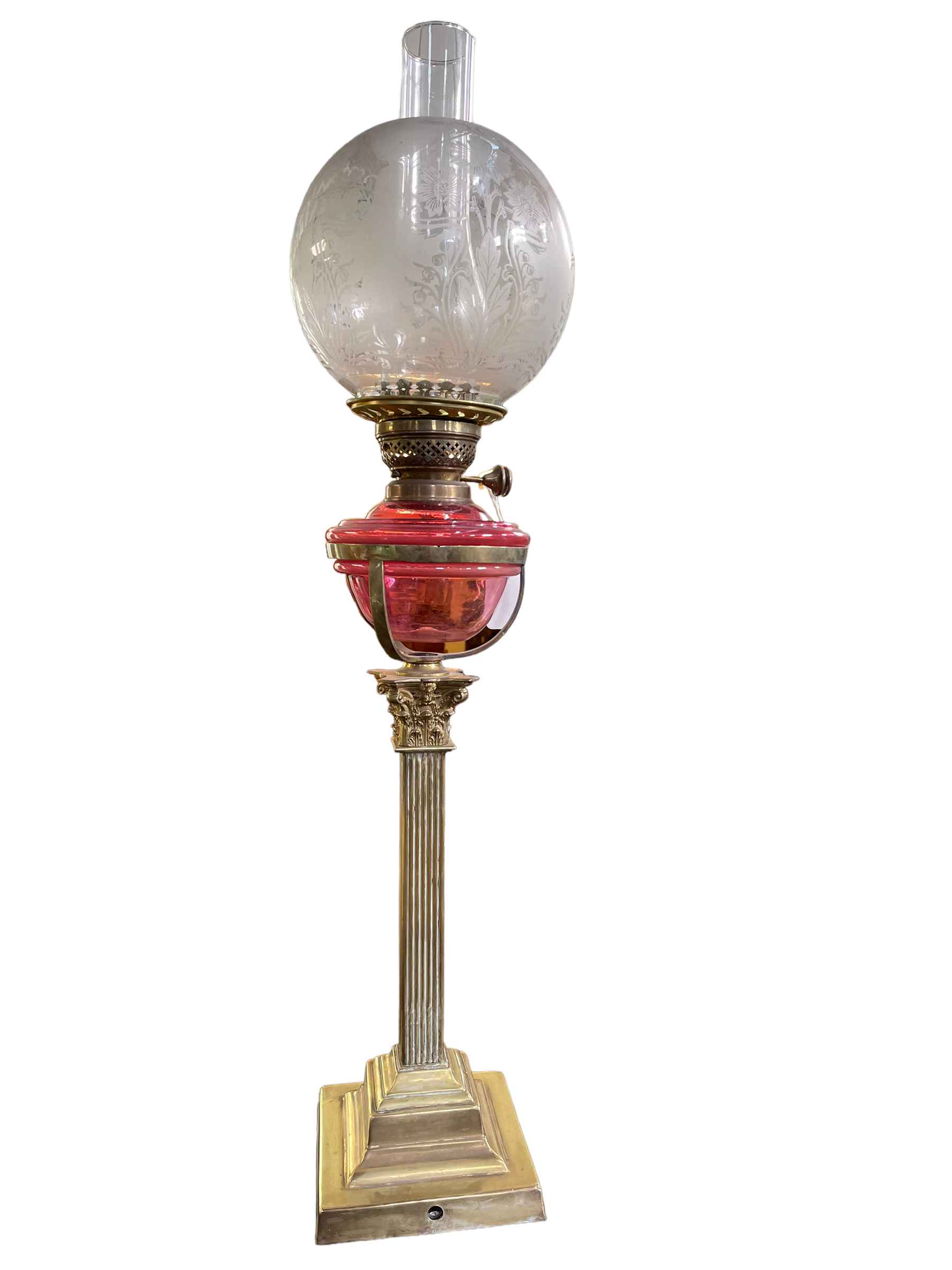 Victorian ruby glass reservoir oil lamp with etched shade.