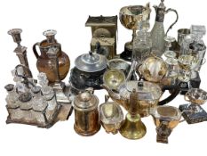 Collection of silver plate including pair of candlesticks, cruet set, trophies, etc,