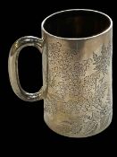 Engraved silver tankard decorated with leaf and foliage, London 1887.