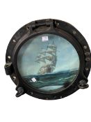 Cast metal ships port hole with picture of galleon.