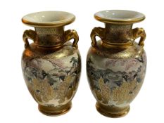 Pair of two handled Japanese Satsuma vases decorated with Geisha in landscape, 18cm.