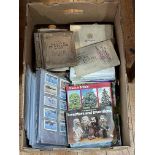 Various albums and loose cigarette cards.