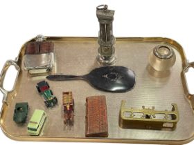 Tray lot with small minders lamp, hip flask, silver mounted match holder, Lesney models, etc.