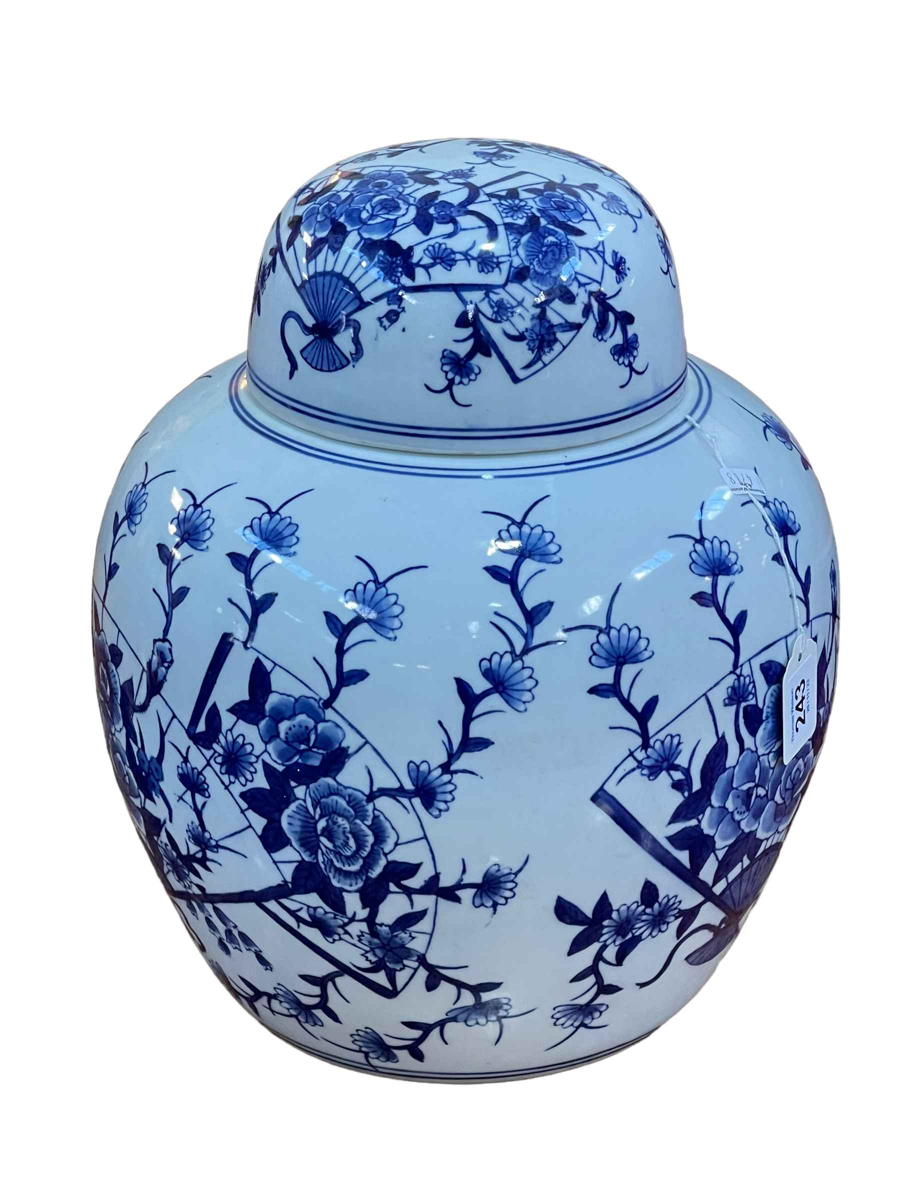 Large Chinese ginger jar with blue and white floral decoration.