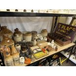 Collection of stone bottles and jars, enamel signs, bell pull, signal box, flat irons, etc.