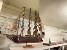 Large model of a sailing galleon with wall shelf.