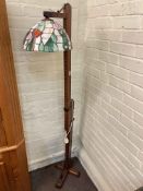 Adjustable Gibbet standard lamp with Tiffany style shade.