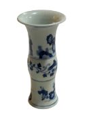 Chinese blue and white waisted vase decorated with figures and floral design, 22cm.