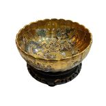 Japanese Satsuma bowl decorated with dragon and figures on gilt ground with wood stand and box,