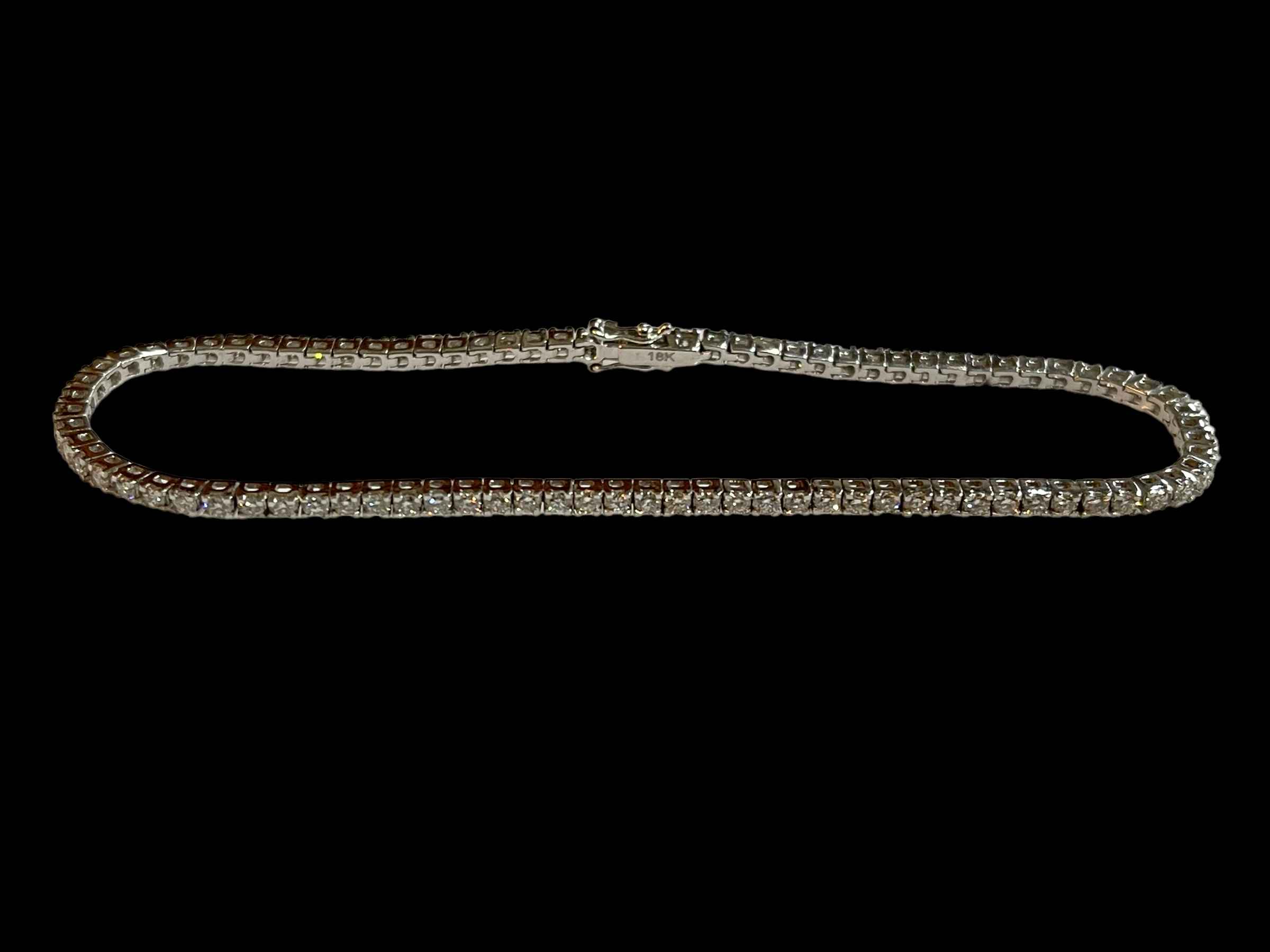 Diamond tennis bracelet set in 18 carat white gold, diamonds totalling 1.90 carats.