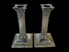 Pair silver column candlesticks, London 1897, 14cm.