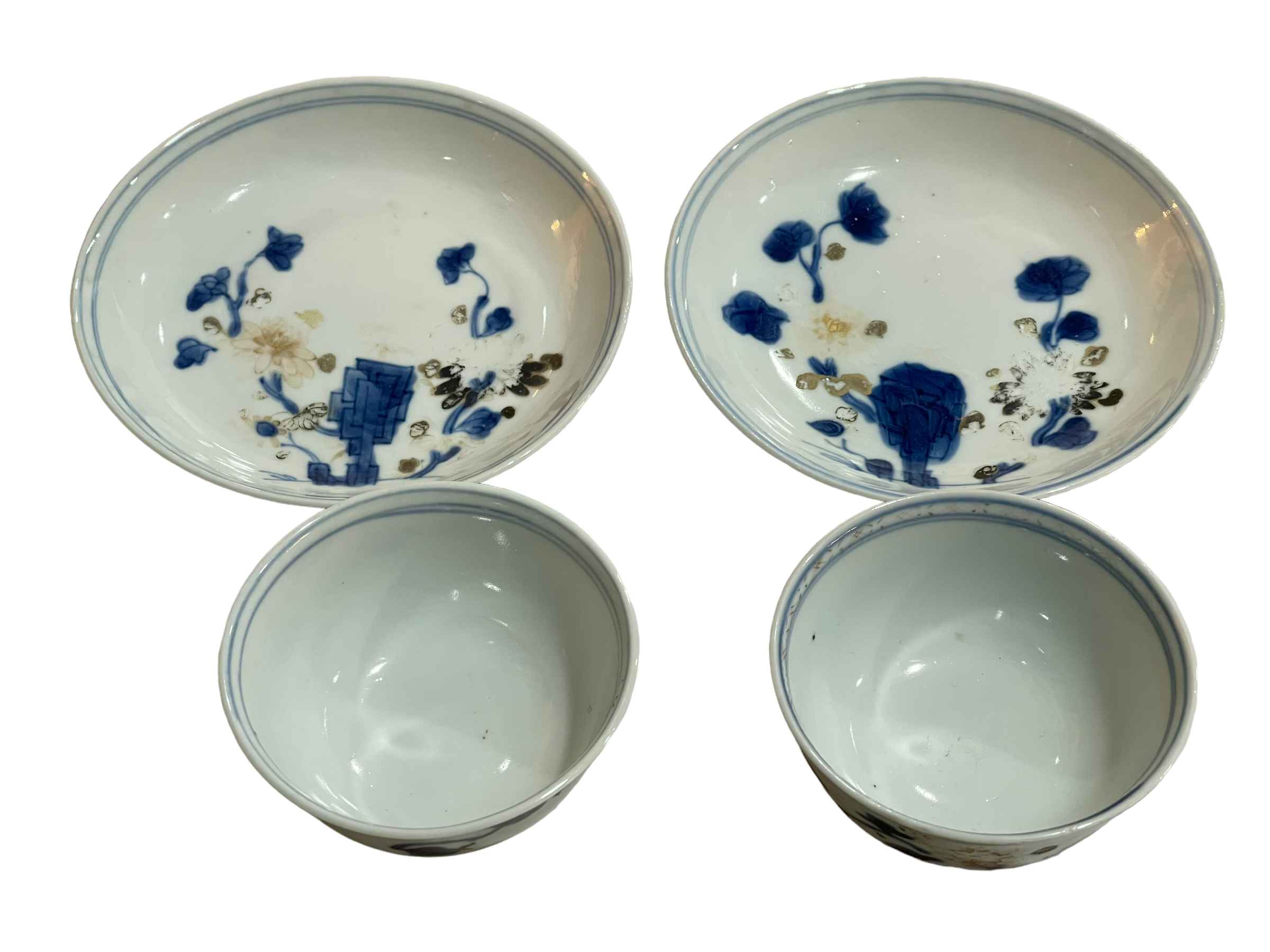 Two Nanking Cargo blue and white tea bowls and saucers, Lot 5709 Christies Sale.