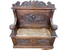 Victorian carved oak lion mask box hall bench, 109cm by 106cm by 47cm.