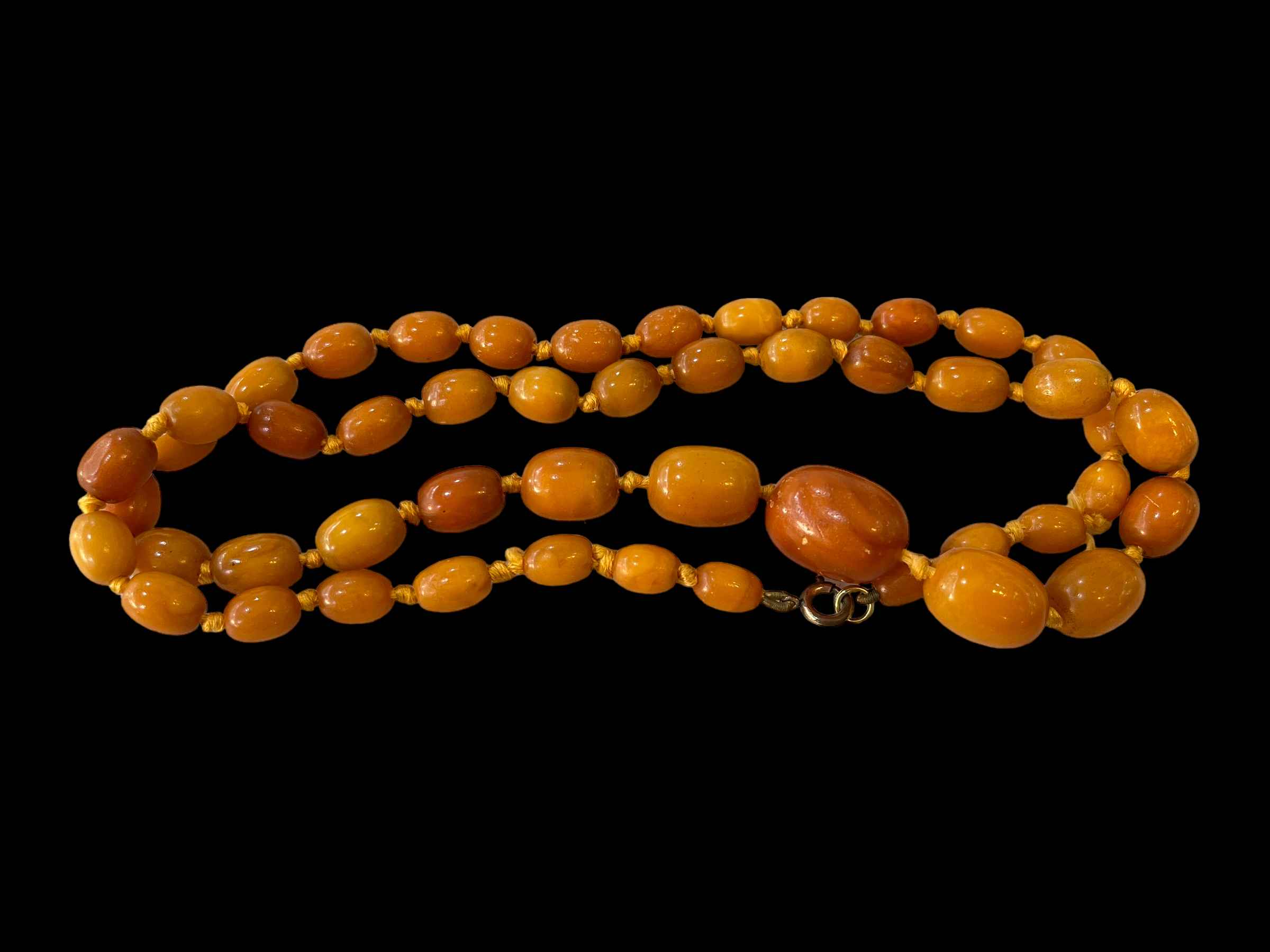 Yellow amber necklace, 70cm length, 32 grams.