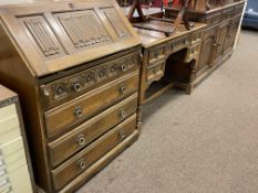 Oak linen fold panel four drawer bureau, similar five drawer side table and three door dresser (3).