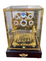 Dent 1769 London rolling ball multi-dial moon phase gilt clock in glass case, 43cm high,