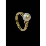 Pearl and diamond 18 carat gold ring, size K.