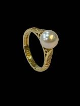 Pearl and diamond 18 carat gold ring, size K.