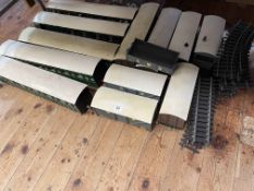 Collection of wooden railway carriages, wagons and track.