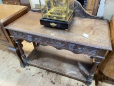 Victorian carved oak lion mask single drawer side table, 98cm by 107cm by 49cm.